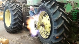 How to mount a tractor tire [upl. by Ahsircal331]