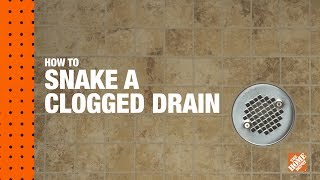 How To Snake A Clogged Drain A DIY Digital Workshop  The Home Depot [upl. by Salohcim991]