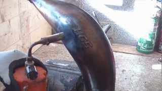 Motorbike exhaust dent removal [upl. by Ydnirb]