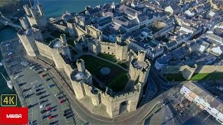 Caernarfon Castle Breathtaking Aerial View [upl. by Lydie]