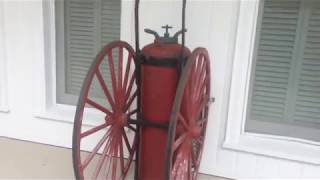 Vintage Red Badger Fire Extinguisher with Large Wagon Wheels amp Handle [upl. by Ile]