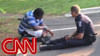 Photo of police officer consoling teen goes viral [upl. by Inahteb]