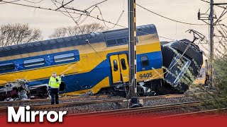 Dutch rail crash One dead and dozens injured after carriages derail [upl. by Aicileb]