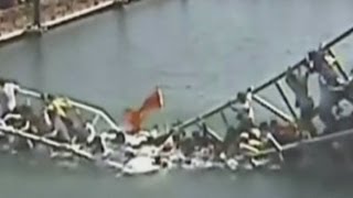 Shocking footage of a packed bridge collapsing in China [upl. by Pengelly]