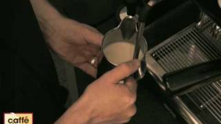 How to froth milk with a steam wand  Barista Tips [upl. by Enilatan]