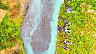 Iceland waterfall Hraunfossar 4K [upl. by Sairtemed312]