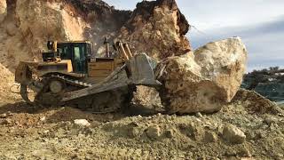 Caterpillar D8T Bulldozer Pushing Huge Stone  Labrianidis Mining Works [upl. by Ingeborg575]