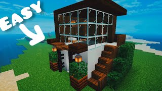 Minecraft Small Modern House  How to build an Easy Modern House Tutorial 4 [upl. by Amaerd]