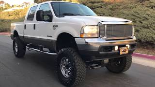 For sale 2002 Ford F250 Lariat 73 L diesel 4 x 4 crew cab SB 115k Lifted Fox Banks 1 owner CA [upl. by Jeritah]