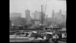 Panorama of New York Citys water front and the Brooklyn Bridge from East River 1903 [upl. by Alegna916]