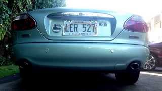 03 Jaguar XK8 Exhaust removed before axle mufflers [upl. by Ataymik587]