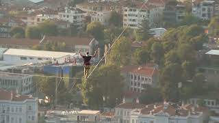 Red Bull athlete Jaan Roose walks tightrope from Asia to Europe over bridge in Türkiyes Istanbul [upl. by Mcilroy116]