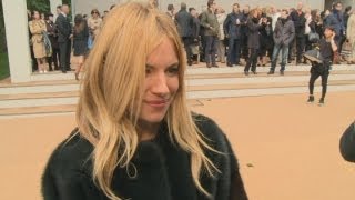 Sienna Miller at LFW Burberry show Working with boyfriend on advert was so funny [upl. by Pierrepont73]