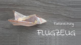 FLUGZEUG aus Geld falten Geldgeschenk basteln Faltanleitung Geldschein Flugzeug für Urlaub [upl. by Enajyram24]