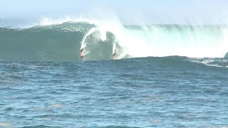 WATCH Surfers charge huge waves at Waimea Bay Peahi [upl. by Aim]