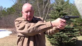 How to Shoot Double Action  A Police Expert Explains [upl. by Tolley]