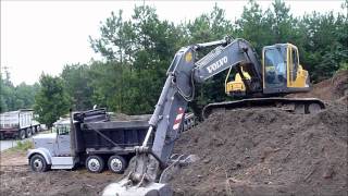 Volvo EC210 Excavator Rocking Out Trucks [upl. by Goldman337]