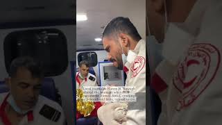 First responder cradling baby in Gaza ambulance breaks down in tears [upl. by Shannon]