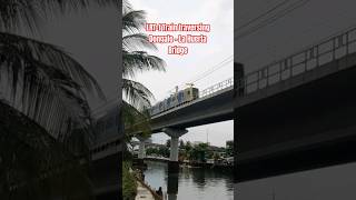 LRT1 Train traversing Dongalo  La Huerta Bridge lrt1caviteextension lrt lightrails train [upl. by Delsman967]