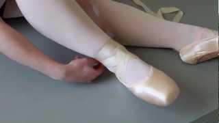 How To Tie Pointe Shoe Ribbons [upl. by Ojeillib]