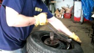 Coats 1010 Tire Changer Mounting Tire [upl. by Anirroc328]