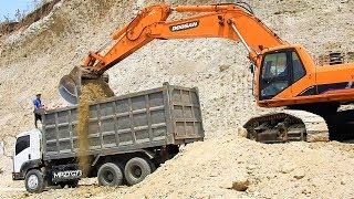 Doosan 500LCV 340LCV Excavator Digging Loading Dirt Into Dump Truck [upl. by Norat85]