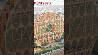 The 138metertall Guangzhou Circle is a landmark building in Guangzhou [upl. by Dragde]