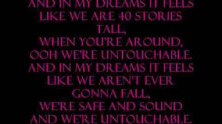 Girls Aloud  quotUntouchablequot LYRICS in video [upl. by Tansy34]