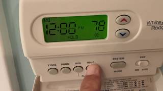 How to change the batteries in a White Rodgers thermostat [upl. by Ajiam]