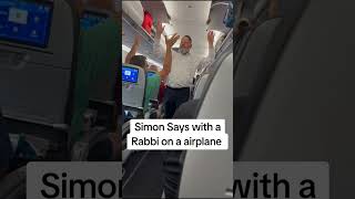 Rabbi Nosson Neuberger entertaining a delayed plane with a game of Simon Says [upl. by Daffodil]