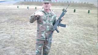 Teaching how to Fire an assault rifle R4 on Automatic [upl. by Coltun]