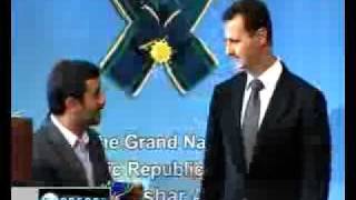 Dictator Ahmadinejad Awards Irans Highest National Medal to Bashar AlAssad [upl. by Illoh937]