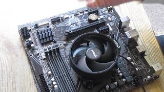 AMD CPU cooler installation How to install AMD AM4 processor and AMD Wraith cooler on motherboard [upl. by Tingey]