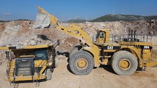 Huge Caterpillar 994 Wheel Loader Loading Caterpillar 777F Dump Truck  Samaras Mining Group [upl. by Calvert929]