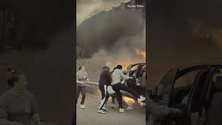 WHOA Good Samaritans save driver from burning car [upl. by Hanej]