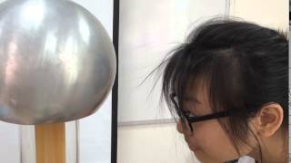 Van de graaff generator and hair [upl. by Arbmahs]