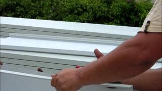 Roofing contractor Florida How to install metal panels [upl. by Oniratac115]