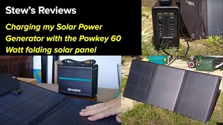 Reviewing my Powkey 60 Watt folding solar panel and charging my Beaudens 166 WH Power Station [upl. by Aikemehs438]