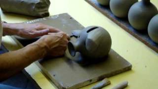 Ingleton Pottery My folks show how to make a clay pottery ceramic piggy bank on the wheel [upl. by Longan630]