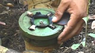 Cambodian shows how to disarm a mine [upl. by Nevyar]