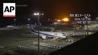 Video shows moment Japan plane crashes in Tokyo airport [upl. by Swehttam332]