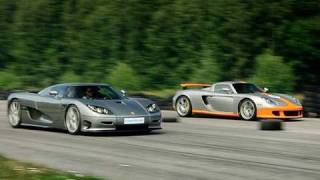 Porsche Carrera GT vs Koenigsegg CCR Evolution x 2 Races to 200 mph  320 kmh [upl. by Eytak649]