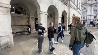 A Couple of Teenagers Mocking The Kings Guard london history horse kingsguard tourist queens [upl. by Nosiddam]