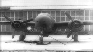 Parachute bombs dropped and 75 mm cannon fired from the B25 Bomber HD Stock Footage [upl. by Raimund239]