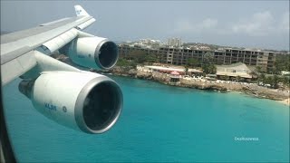 Wing view KLM 747 Landing at St Maarten [upl. by Ateiluj]