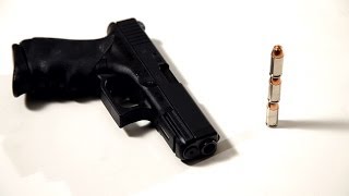 How to Assemble a Glock 23  Gun Guide [upl. by Ahsinrat]